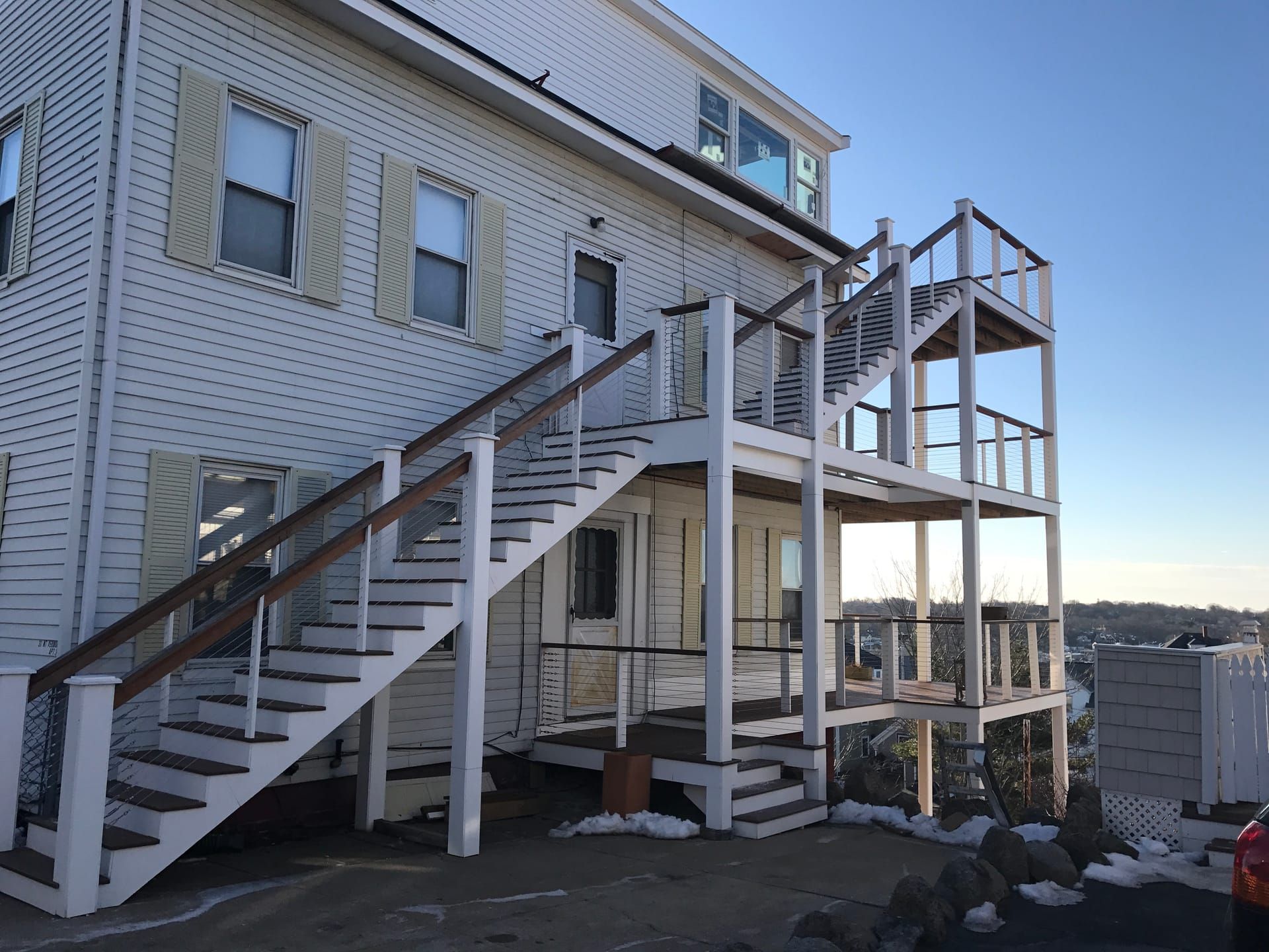 Multi-level deck and stairs — harbor view