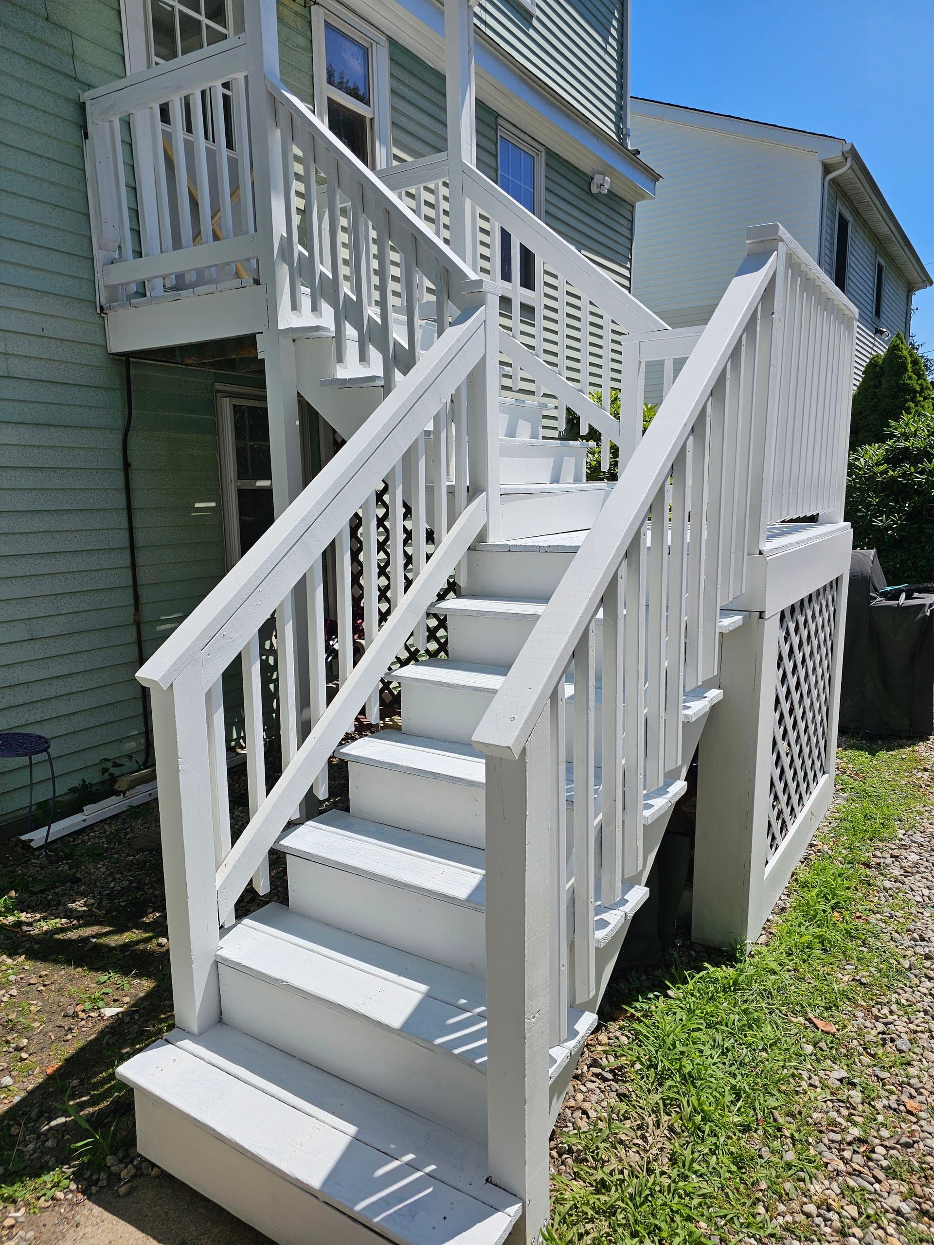 White painted multi-level deck