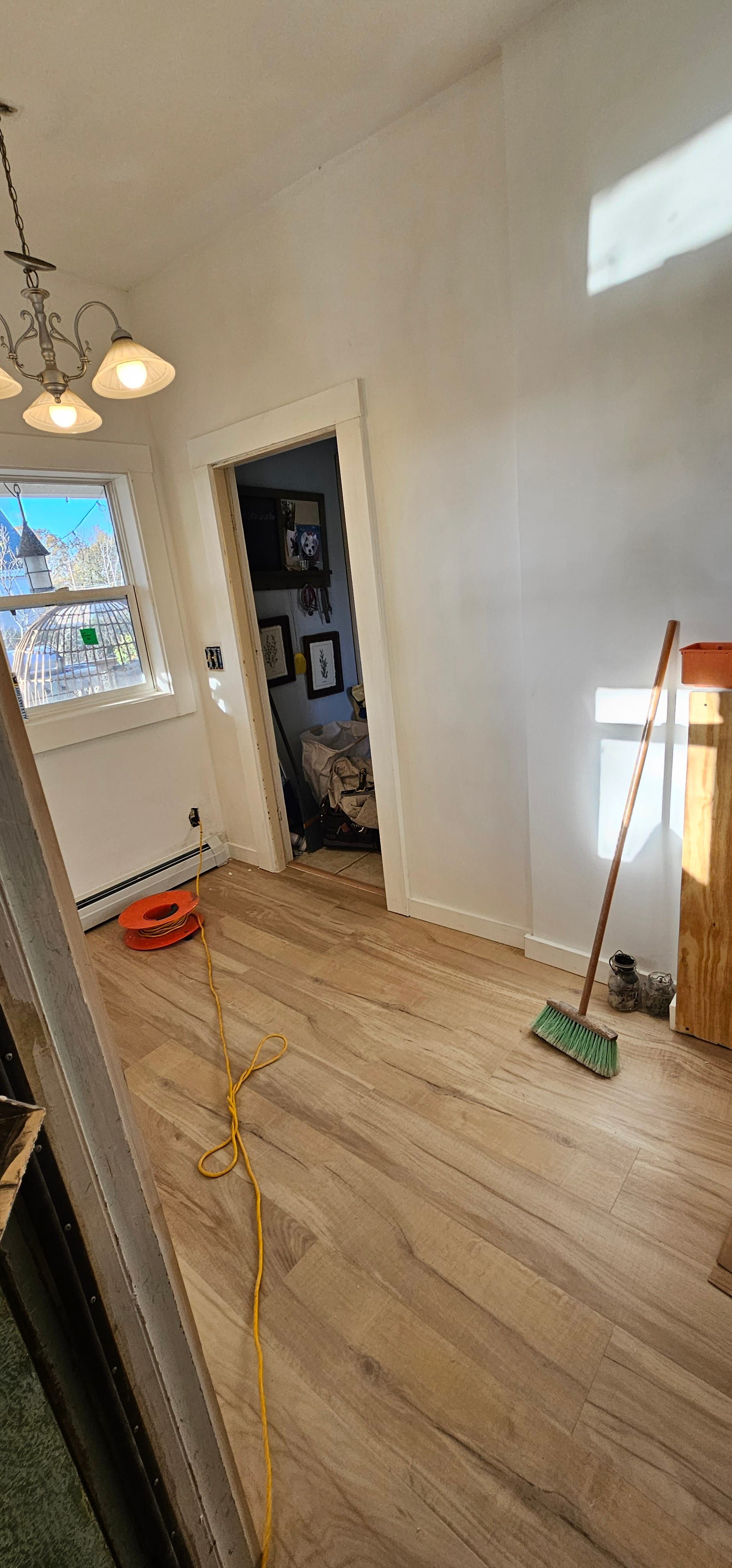 Interior pass-through with vinyl plank flooring