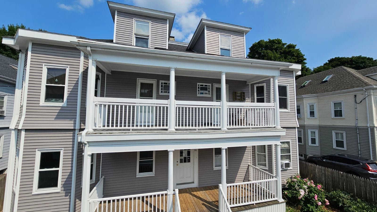 Multi-family renovation with porches