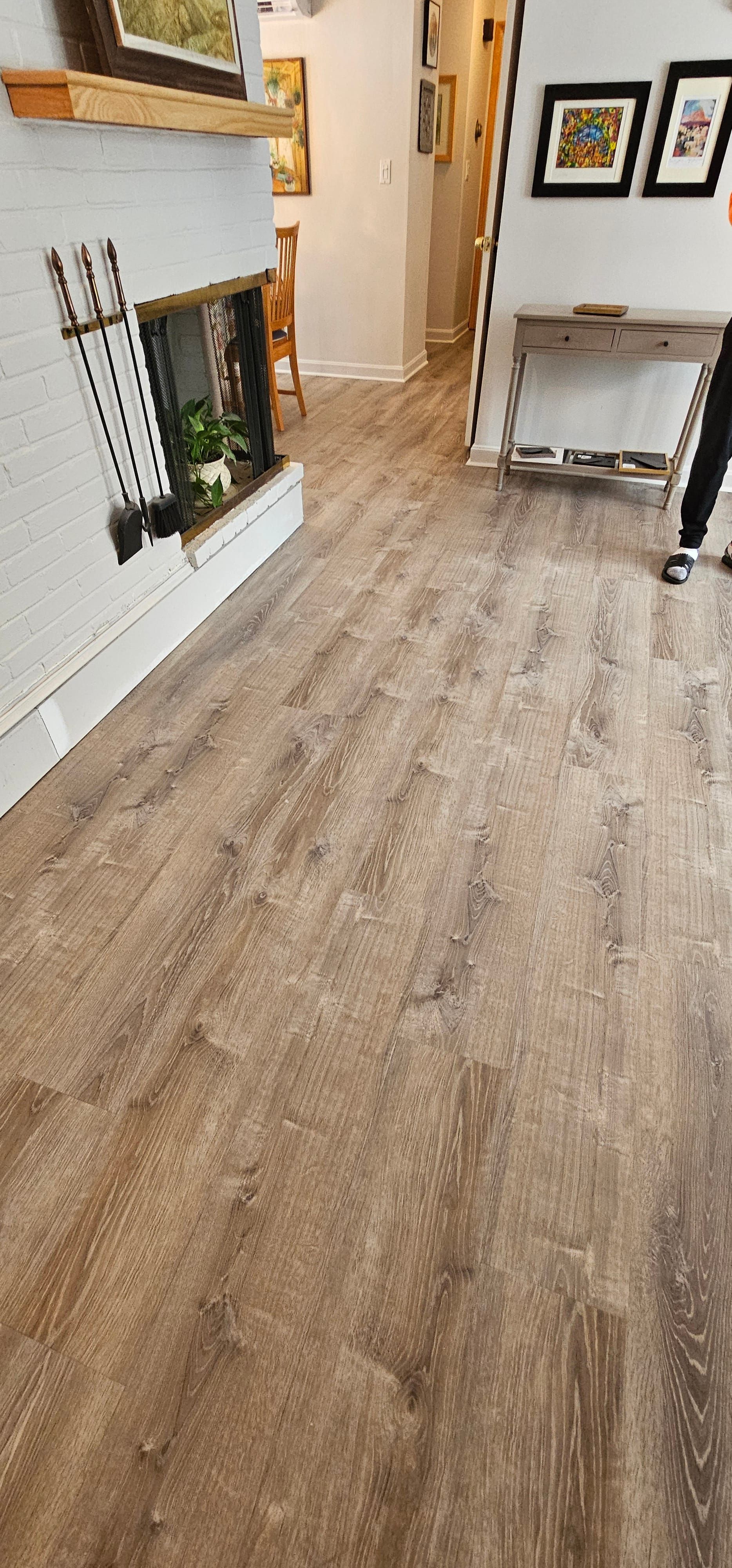 Remodeled living room with vinyl plank flooring